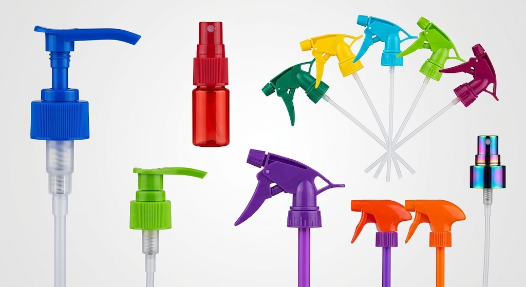 Collection of colorful plastic lotion pumps, fine mist sprayers, and trigger sprayers manufactured by Alpha Plastic BD for packaging and dispensing systems.